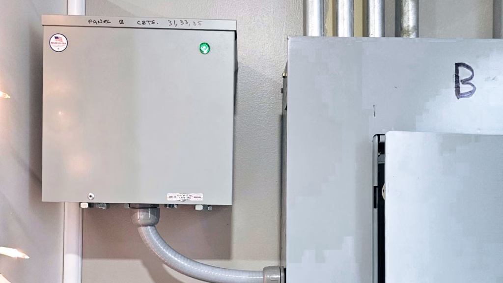Smart Electricity Optimizer installed near home electrical panel—reduce dirty electricity and lower bills.